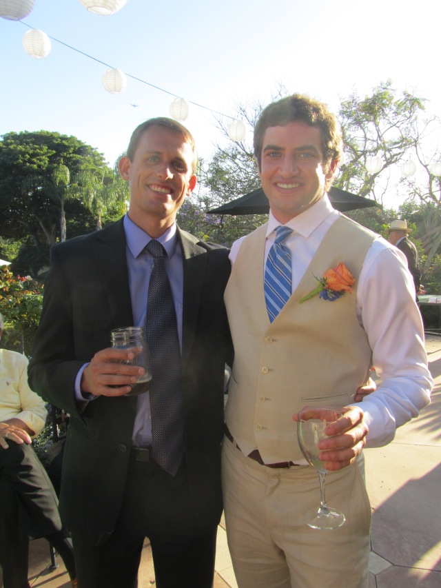 Two of Andy's groomsmen relax after the ceremony.
